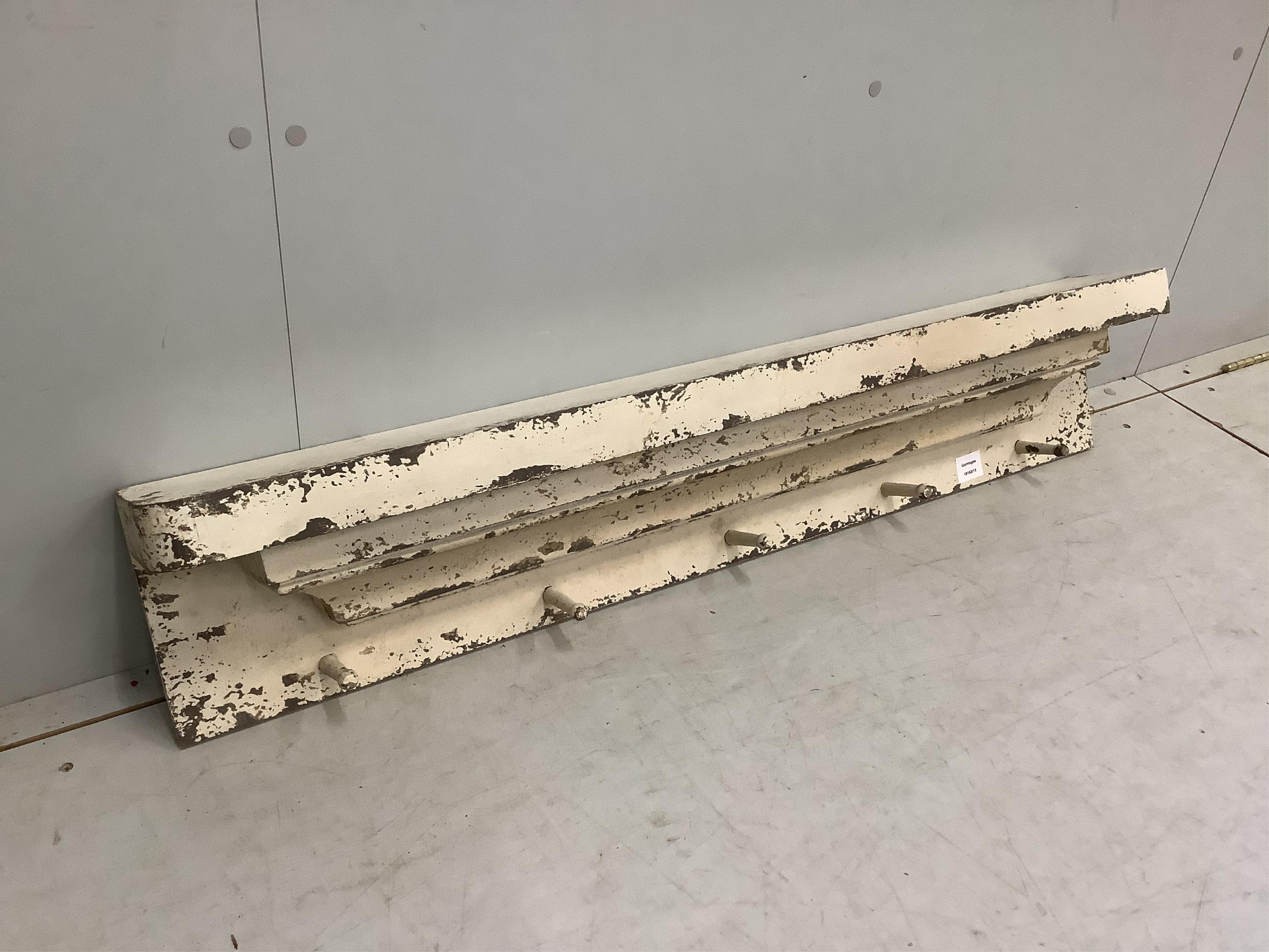 A painted hanging coat rack, width 114cm, height 22cm